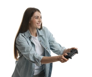 Happy woman playing video games with controller on white background