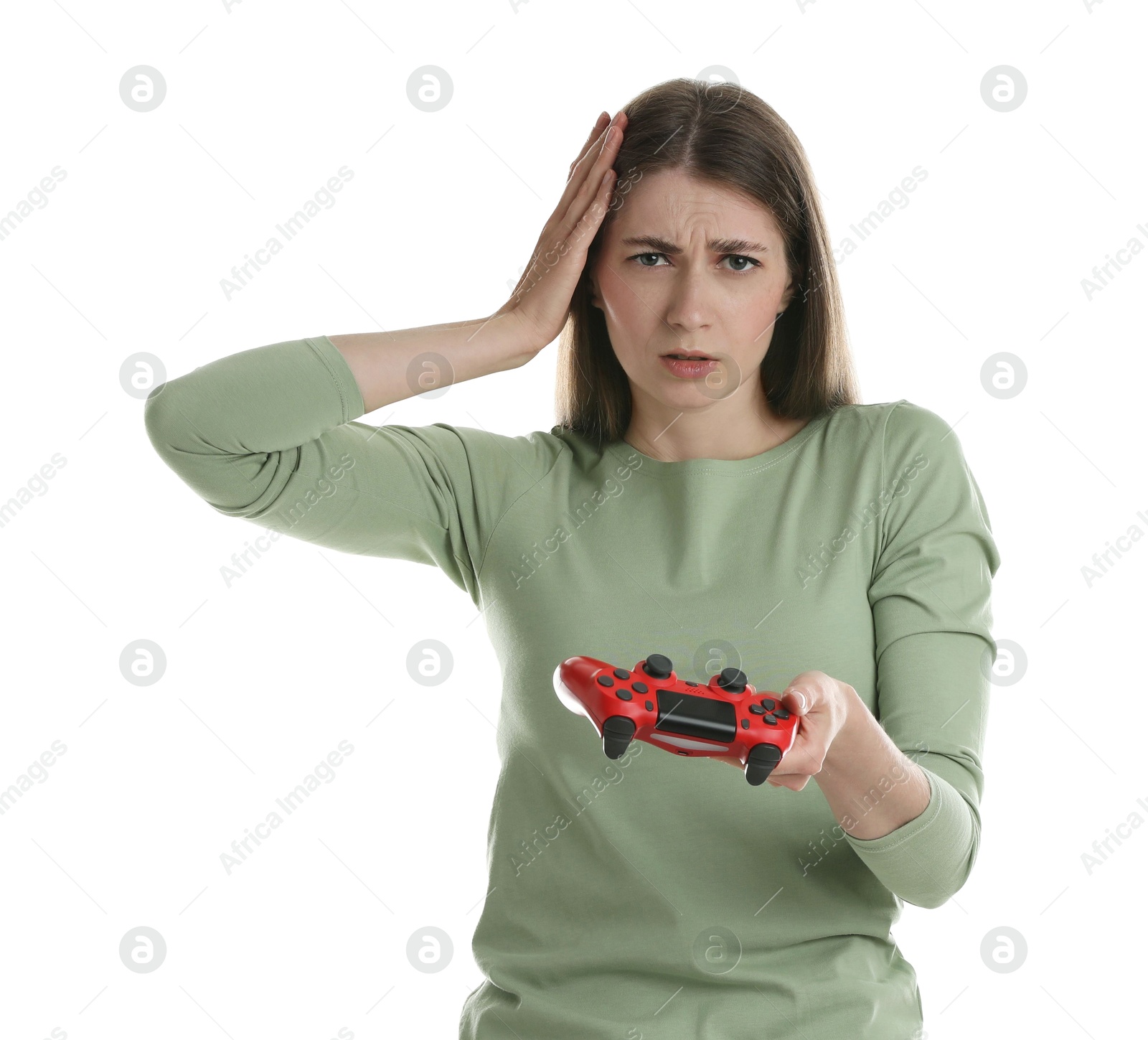 Photo of Unhappy woman with controller on white background