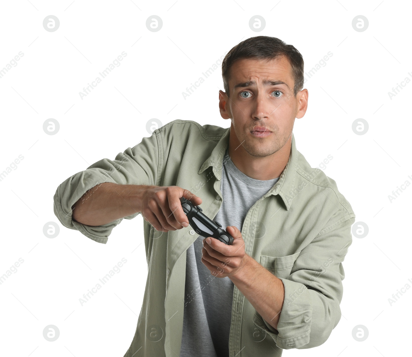 Photo of Man playing video games with controller on white background