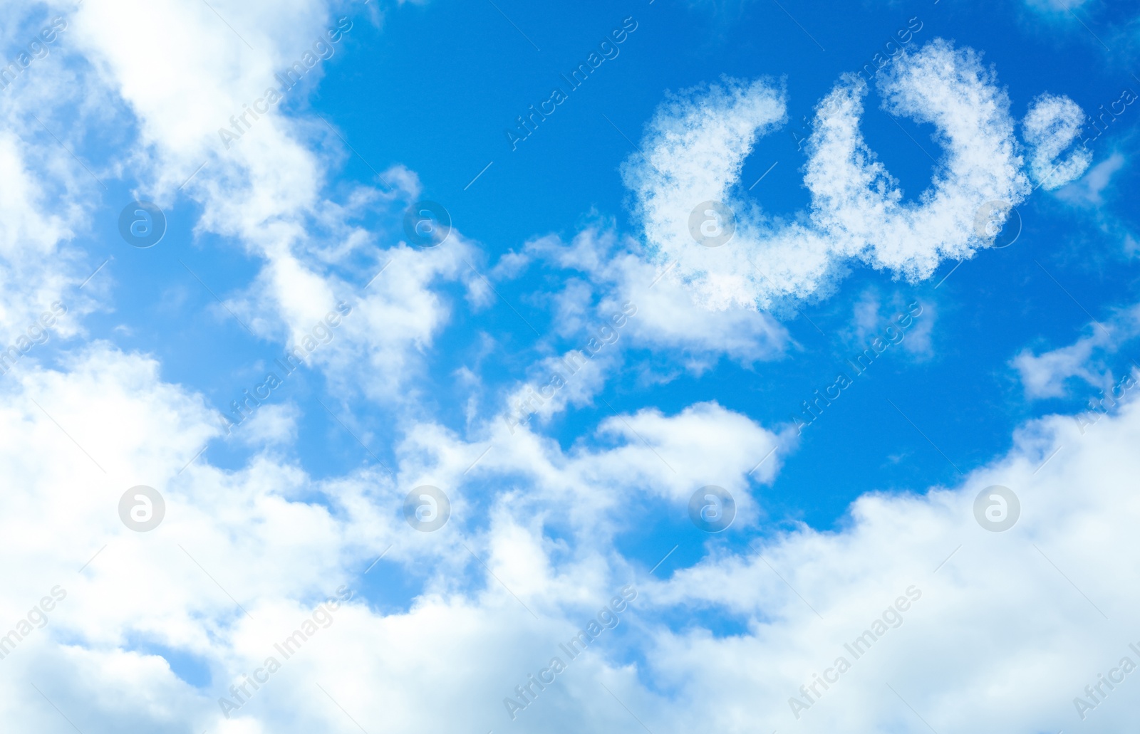 Image of Blue sky with CO2 chemical formula and clouds. Carbon dioxide emissions