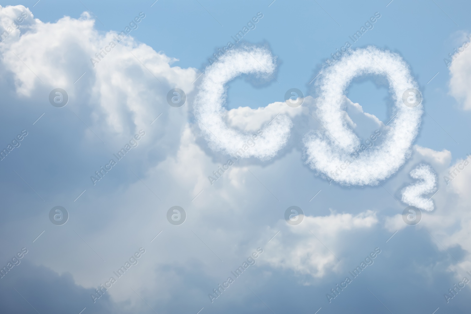 Image of Blue sky with CO2 chemical formula and clouds. Carbon dioxide emissions