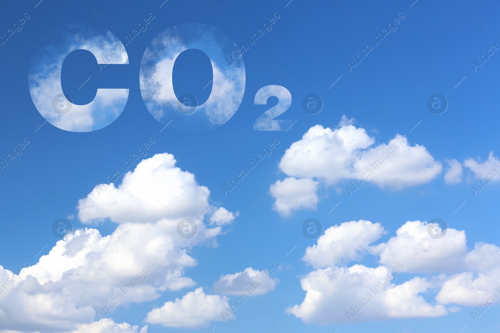 Image of Blue sky with CO2 chemical formula and clouds. Carbon dioxide emissions