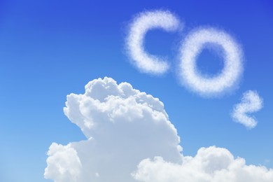 Image of Blue sky with CO2 chemical formula and clouds. Carbon dioxide emissions