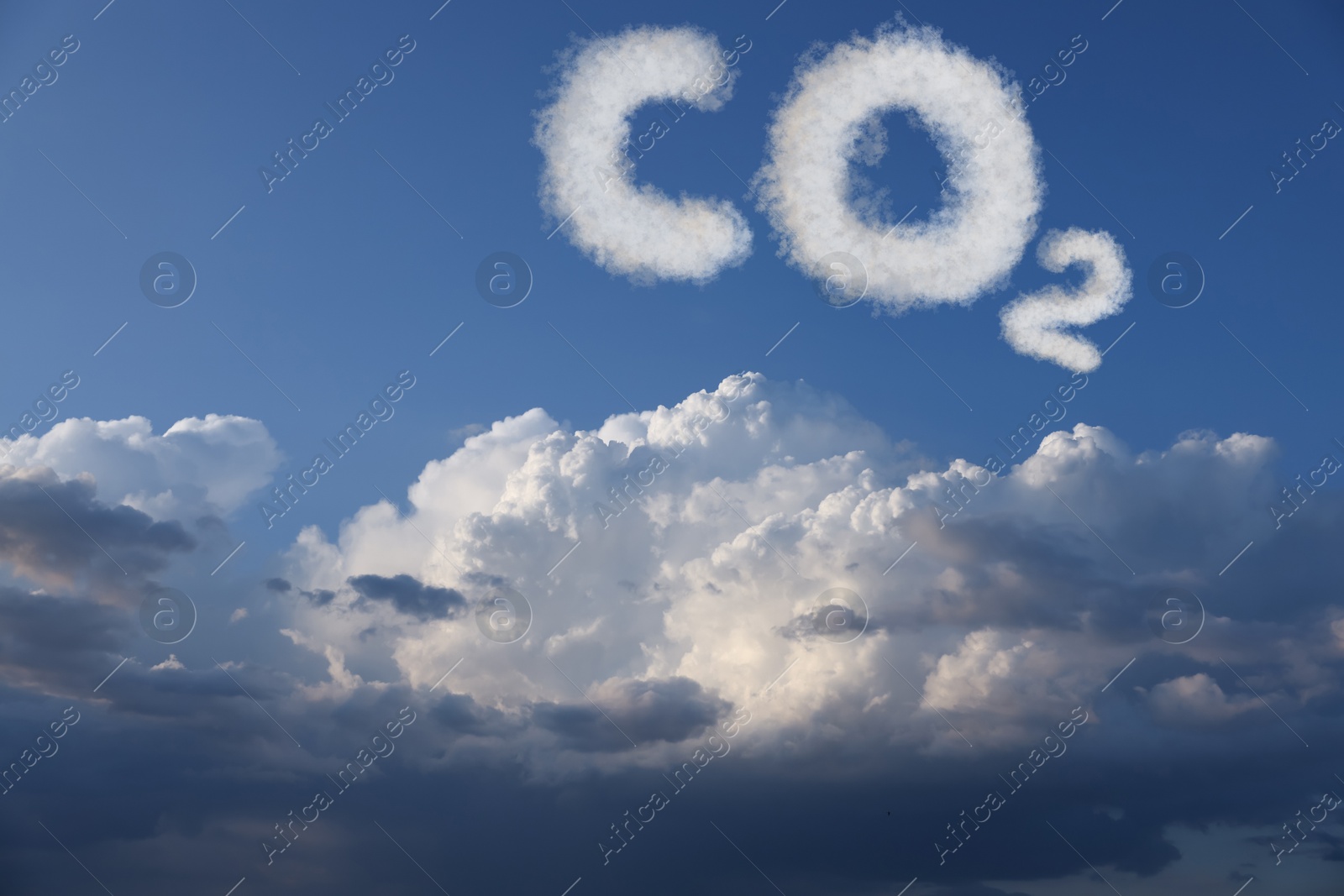 Image of Blue sky with CO2 chemical formula and clouds. Carbon dioxide emissions