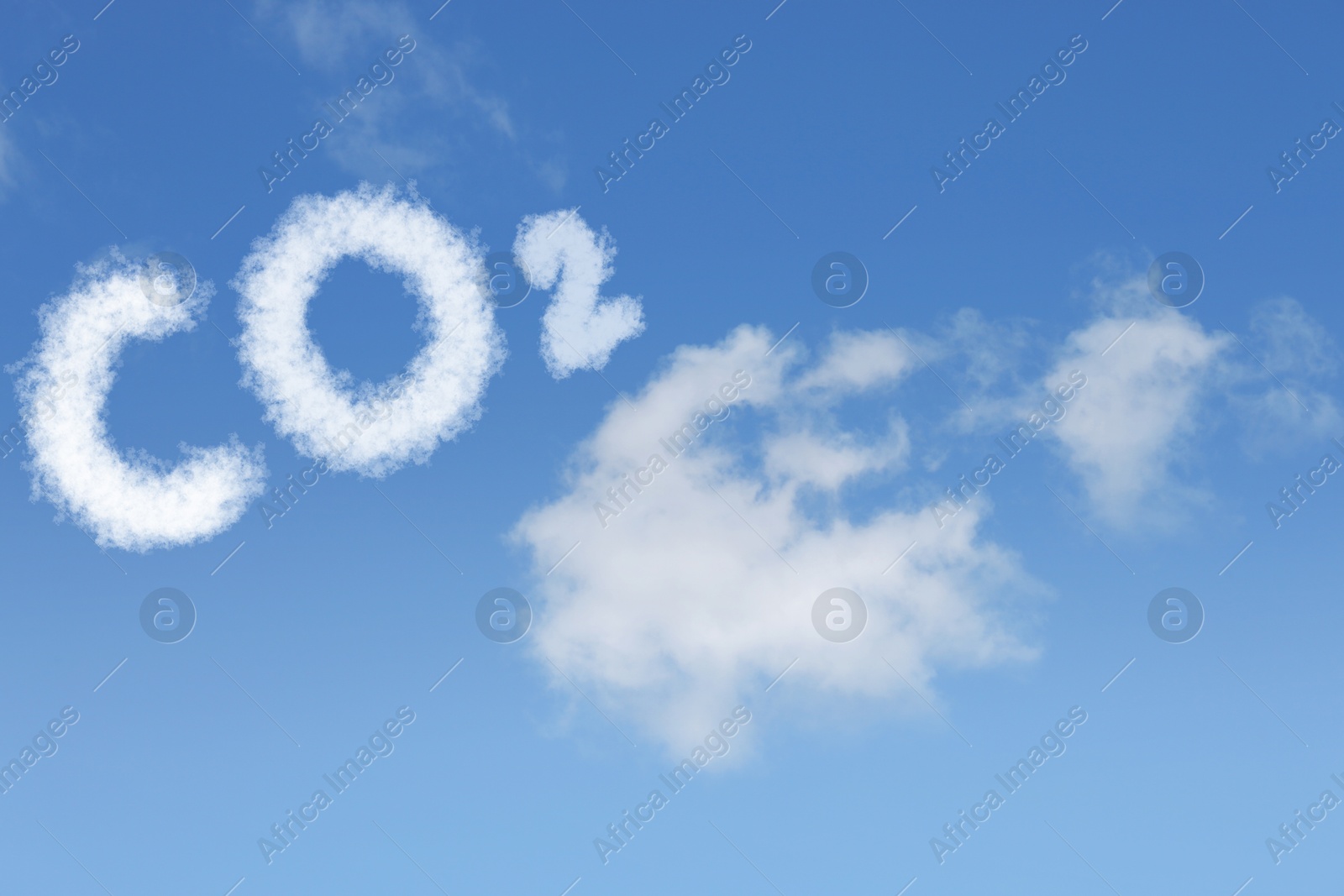 Image of Blue sky with CO2 chemical formula and clouds. Carbon dioxide emissions