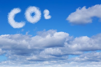 Image of Blue sky with CO2 chemical formula and clouds. Carbon dioxide emissions