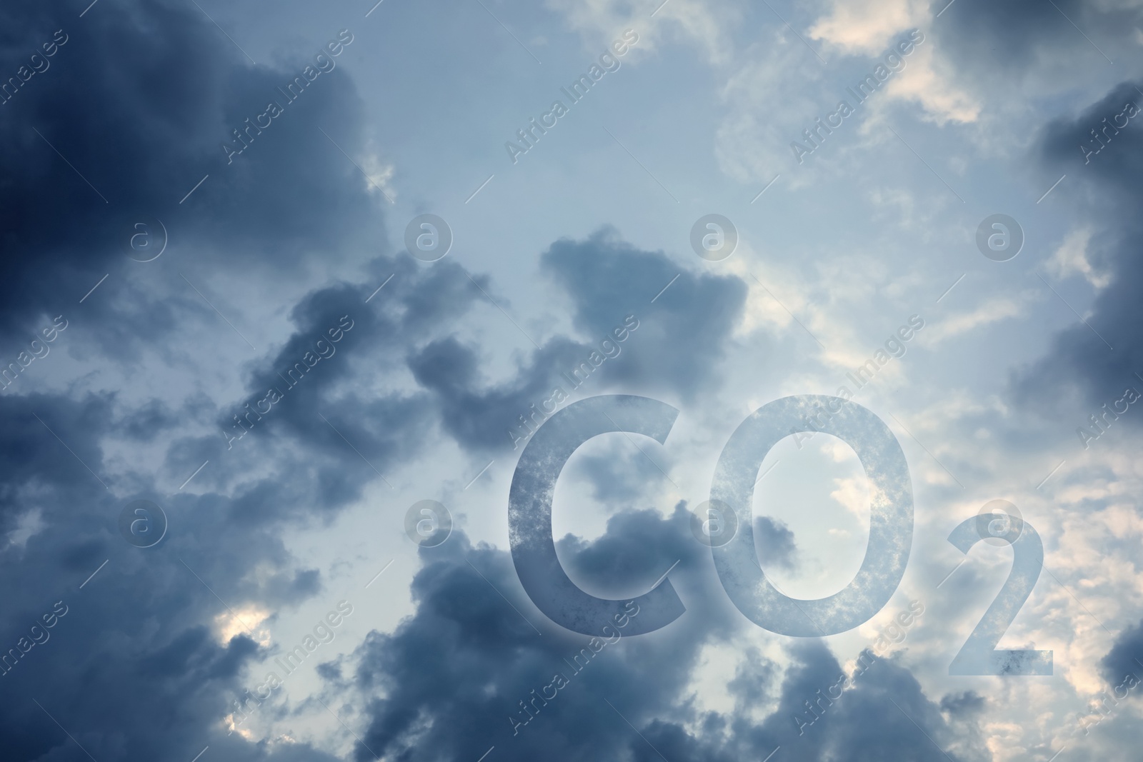 Image of Sky with CO2 chemical formula and clouds. Carbon dioxide emissions