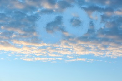 Image of Blue sky with CO2 chemical formula and clouds. Carbon dioxide emissions