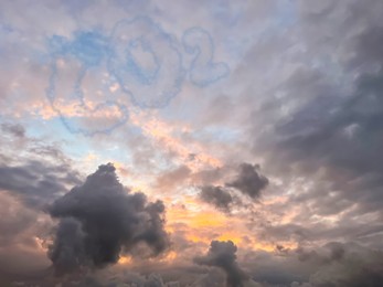 Image of Sunset sky with CO2 chemical formula and clouds. Carbon dioxide emissions