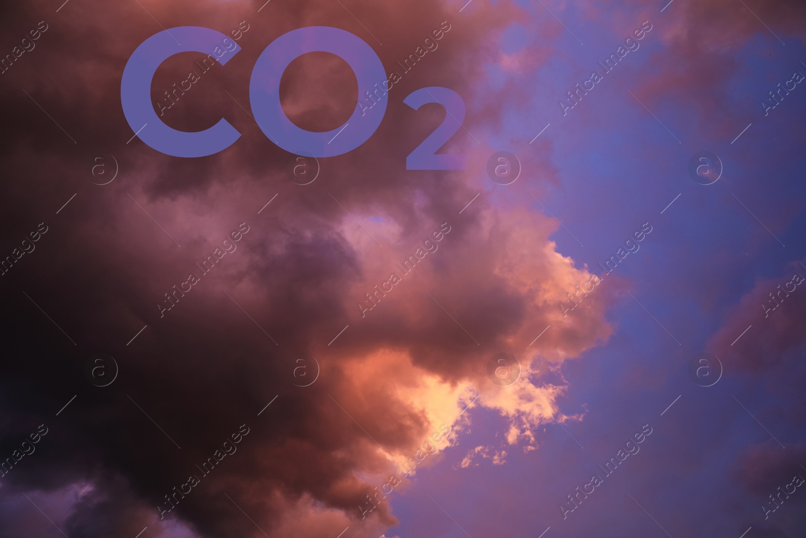 Image of Sunset sky with CO2 chemical formula and clouds. Carbon dioxide emissions