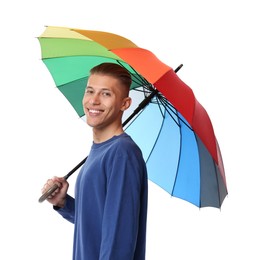 Photo of Young man with rainbow umbrella on white background