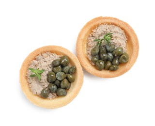 Photo of Delicious canapes with pate, capers and microgreens isolated on white, top view