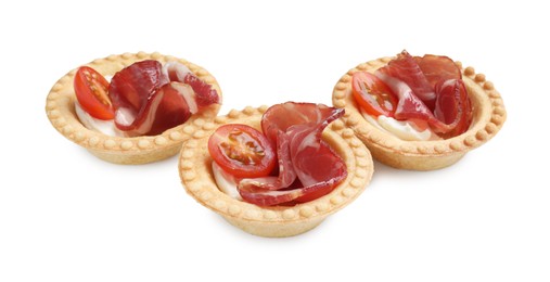 Photo of Delicious canapes with jamon, cream cheese and cherry tomatoes isolated on white