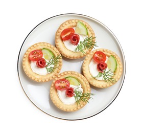 Delicious canapes with dry smoked sausages, cream cheese and vegetables isolated on white, top view