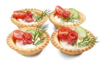 Delicious canapes with dry smoked sausages, cream cheese and vegetables isolated on white