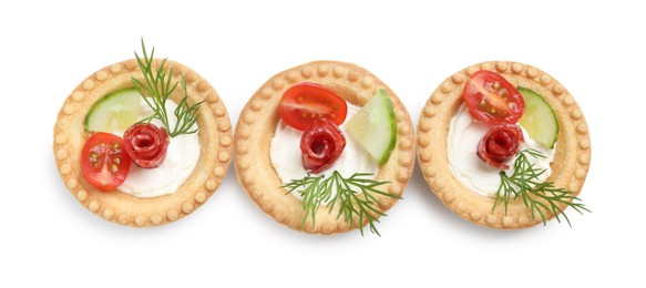 Photo of Delicious canapes with dry smoked sausages, cream cheese and vegetables isolated on white, top view