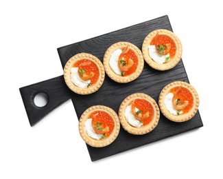 Delicious canapes with shrimps, red caviar and cream cheese isolated on white, top view