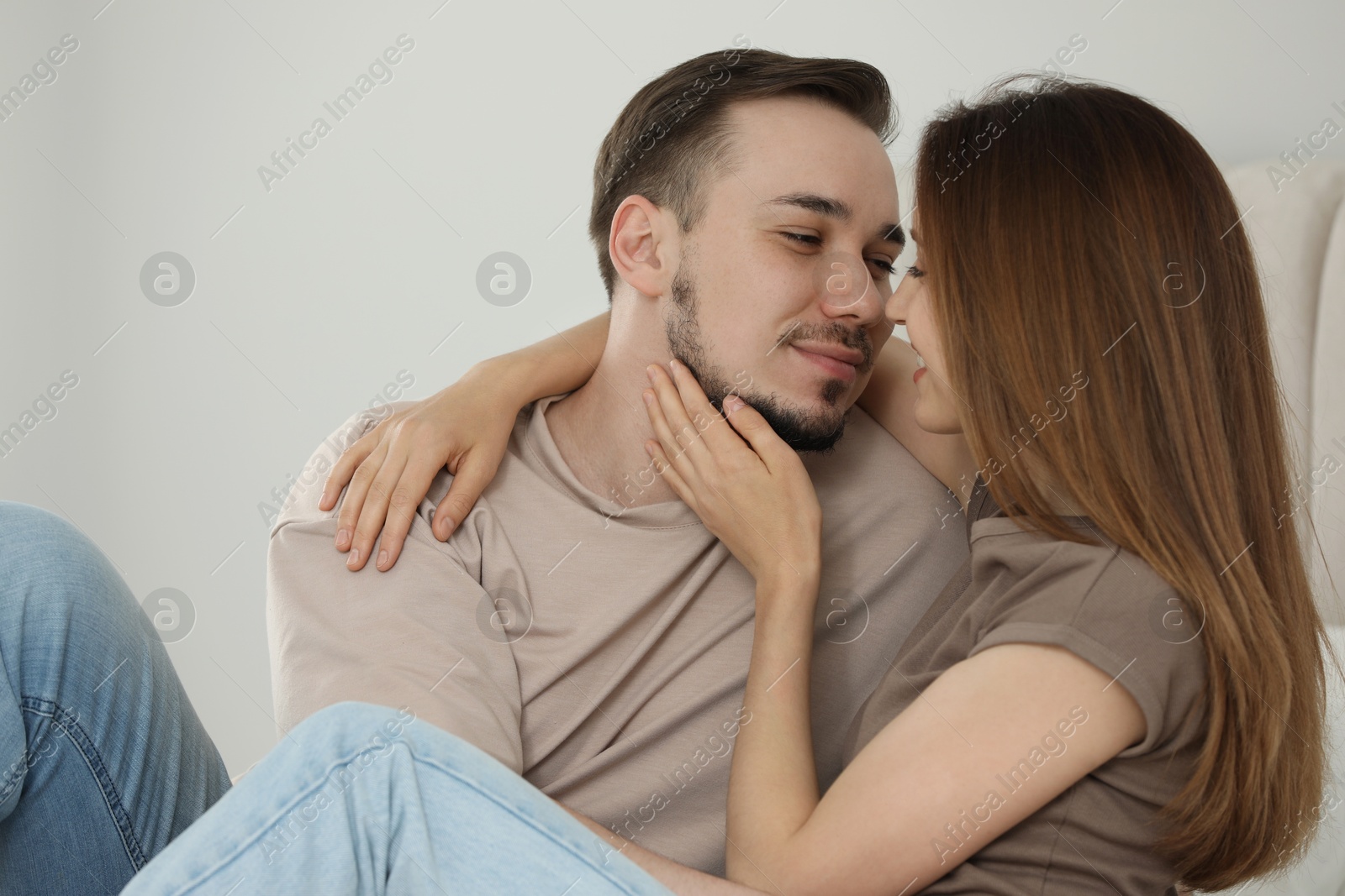 Photo of Lovely couple enjoying each other at home