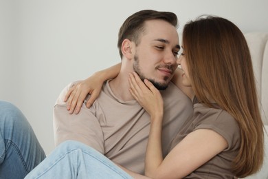 Photo of Lovely couple enjoying each other at home