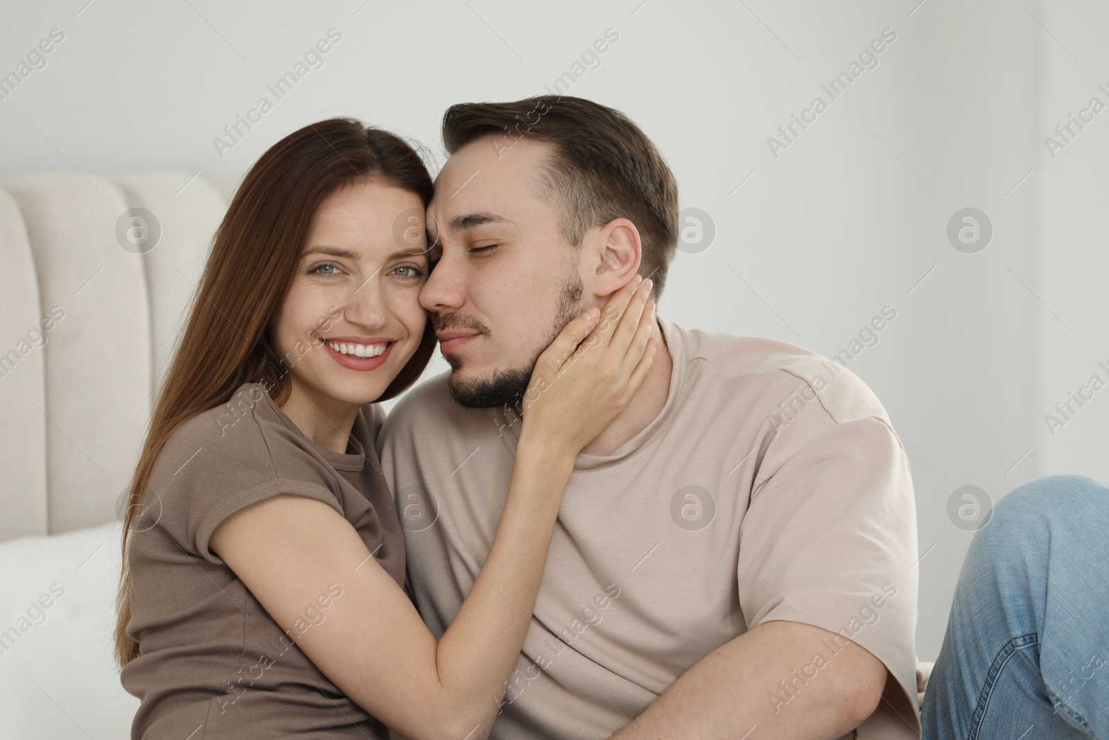 Photo of Lovely couple enjoying each other at home