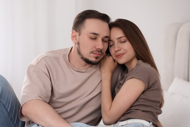 Lovely couple enjoying each other at home