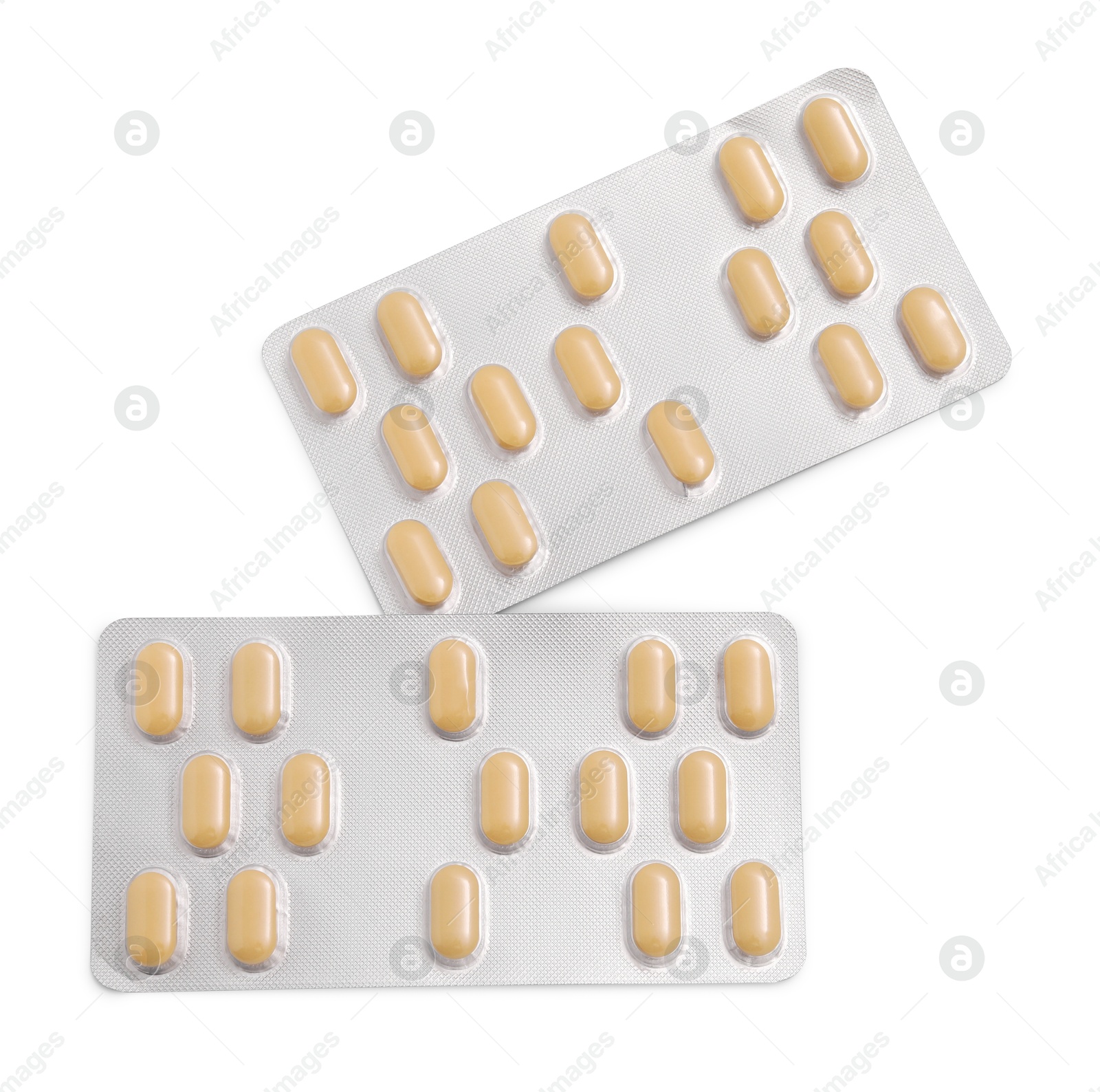 Photo of Antibiotic pills in blisters isolated on white, top view