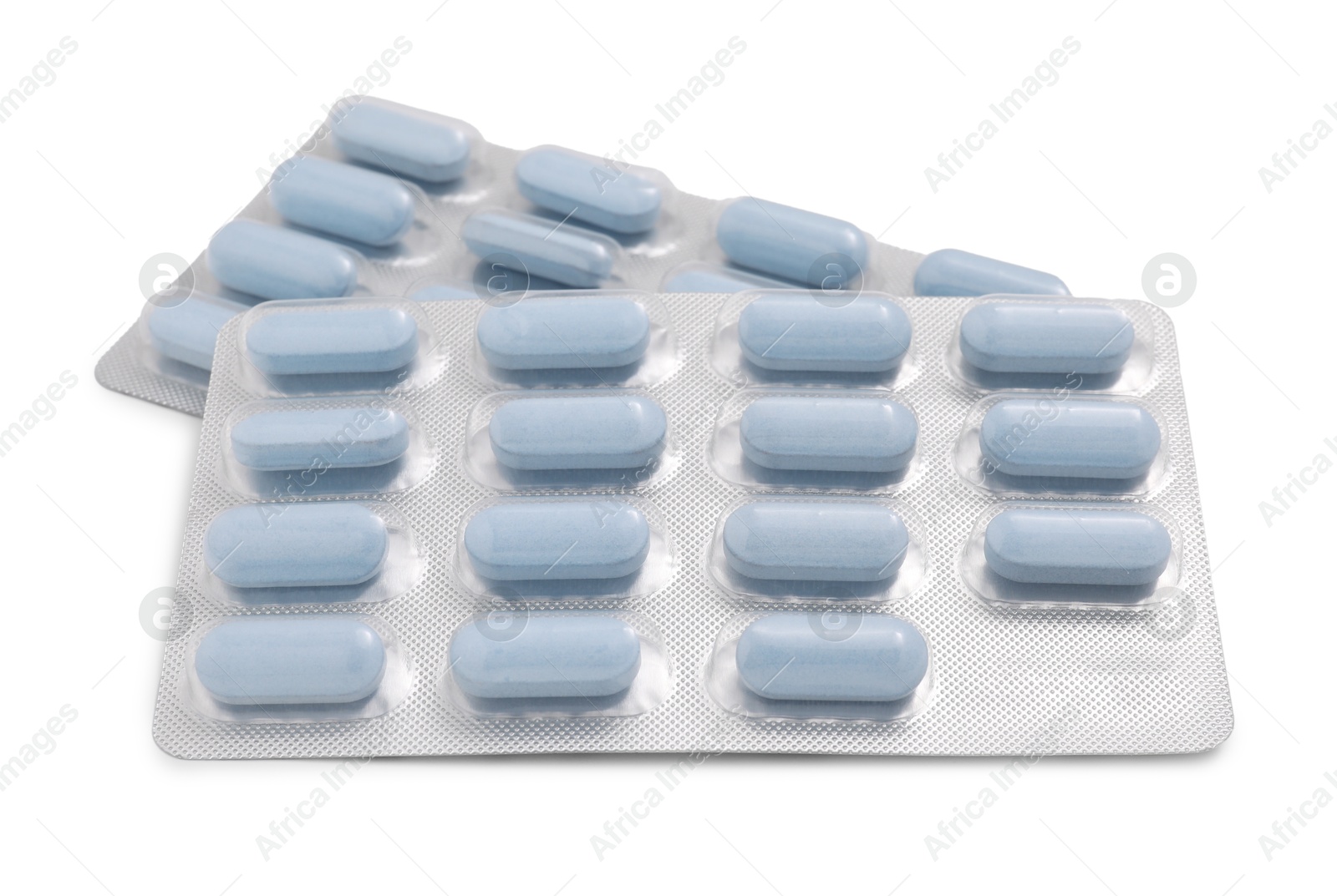 Photo of Antibiotic pills in blisters isolated on white