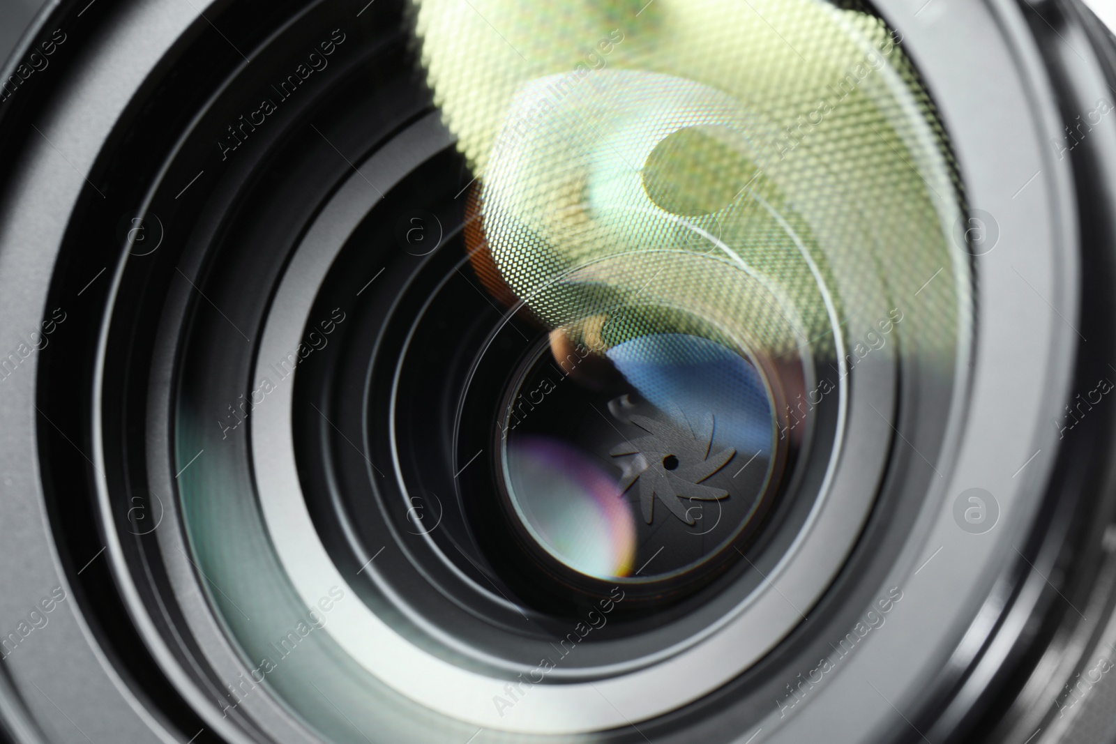 Photo of Lens of professional camera, closeup. Photographer's equipment