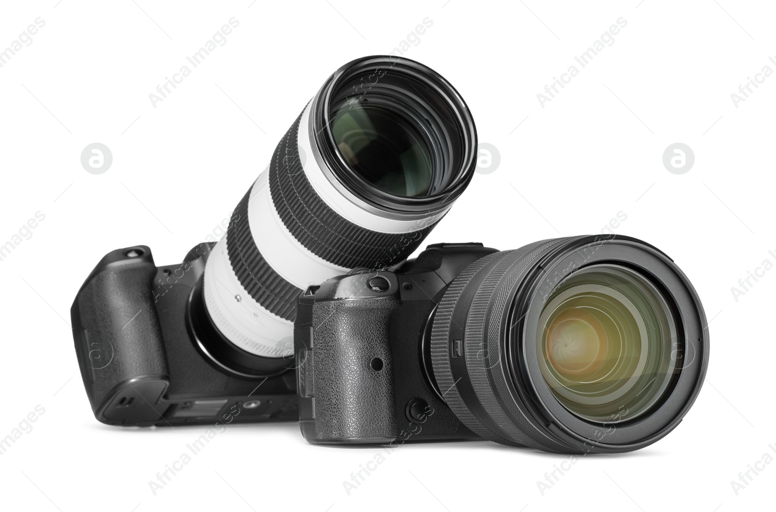 Photo of Modern cameras isolated on white. Photographer's equipment