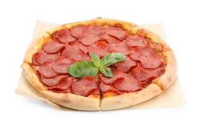 Tasty pepperoni pizza with basil isolated on white