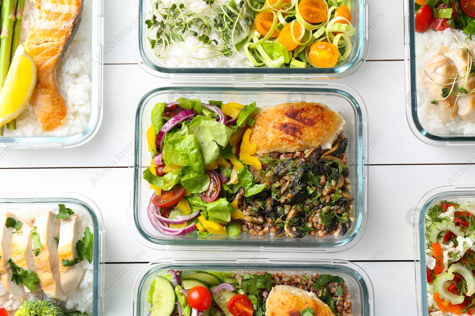 Photo of Healthy meal. Containers with different products on white wooden table, flat lay