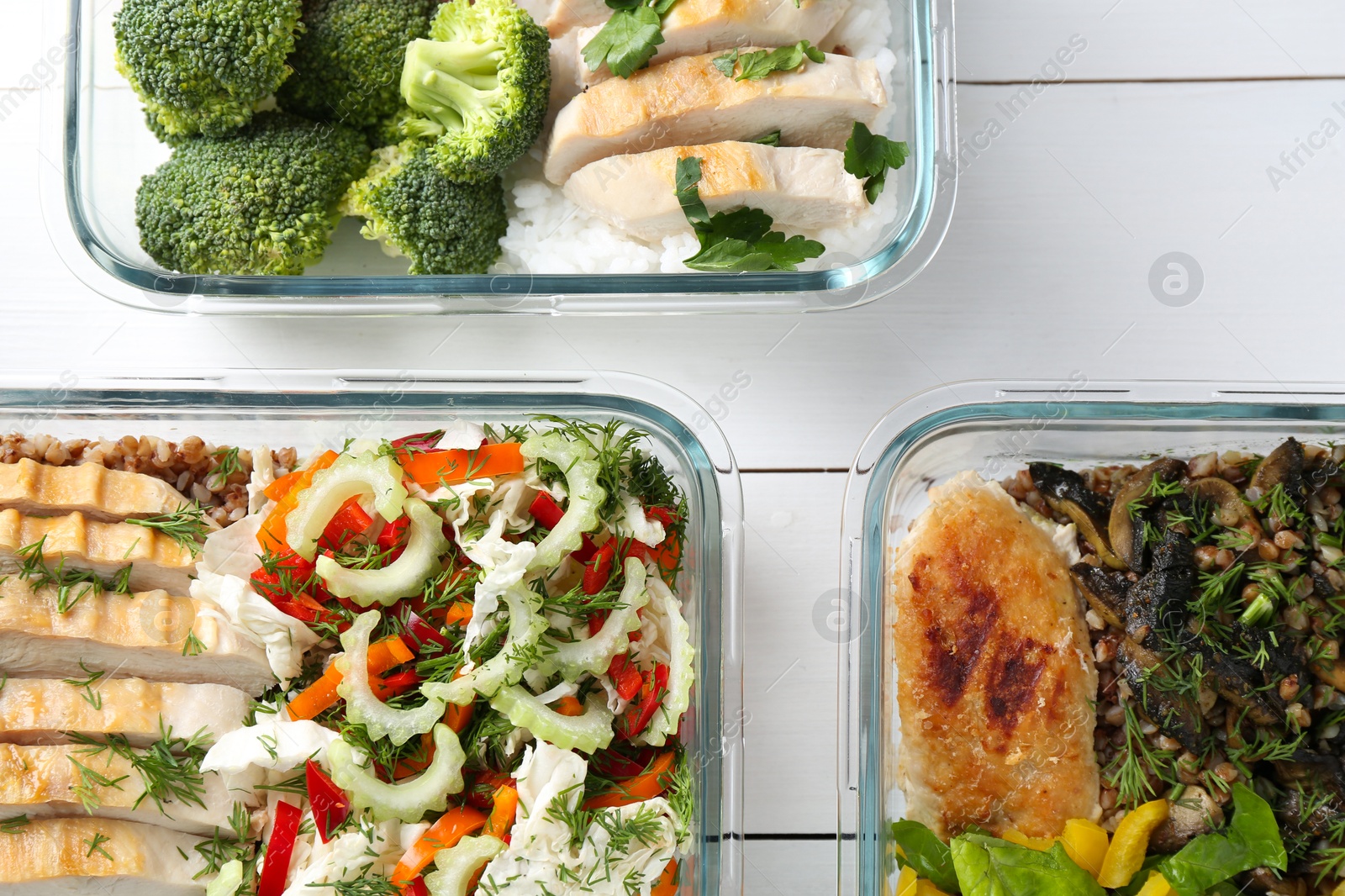 Photo of Healthy meal. Containers with different products on white wooden table, flat lay