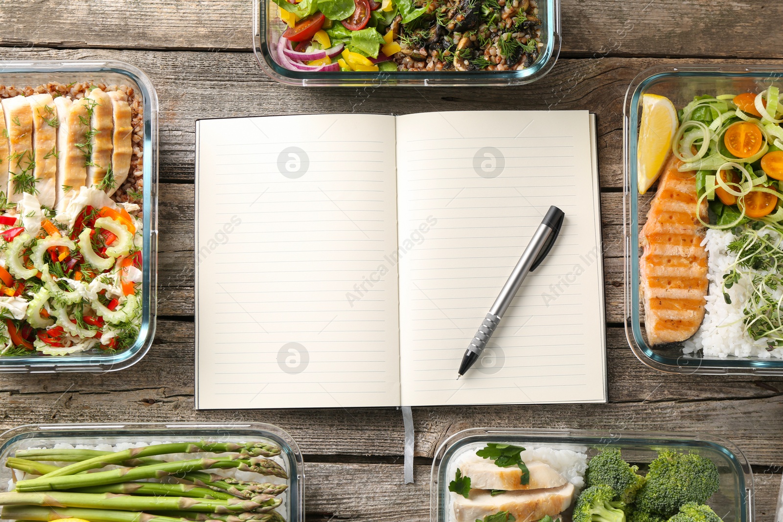 Photo of Healthy meal. Open notebook and containers with different products on wooden table, flat lay