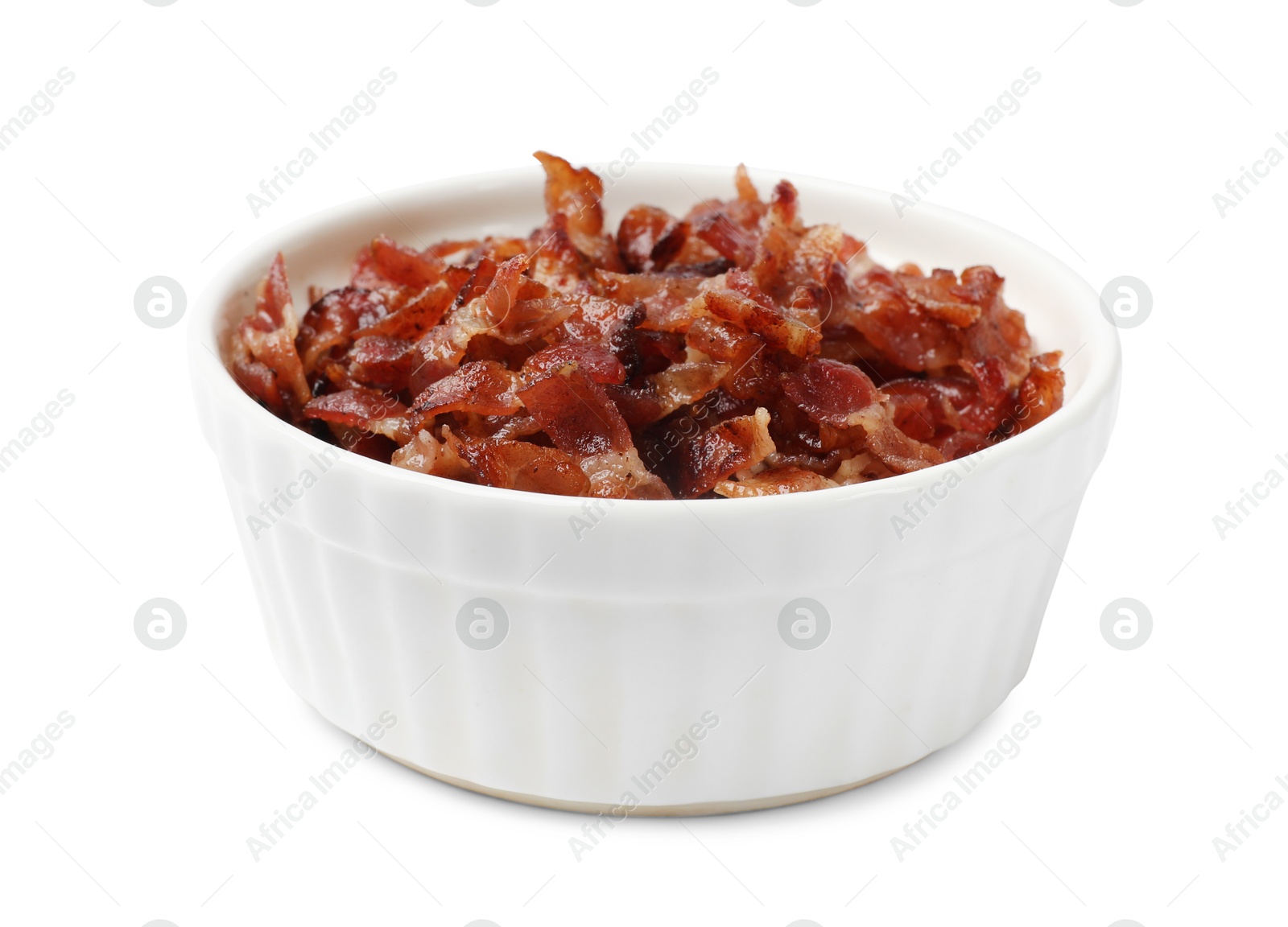 Photo of Slices of tasty fried bacon in bowl isolated on white