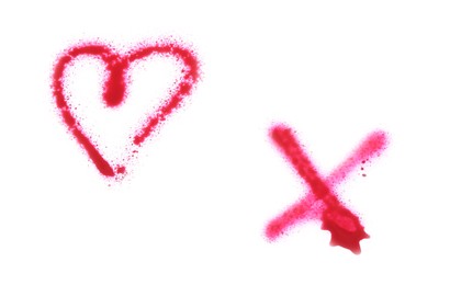 Photo of Crossed lines and heart drawn by pink spray paint isolated on white, top view