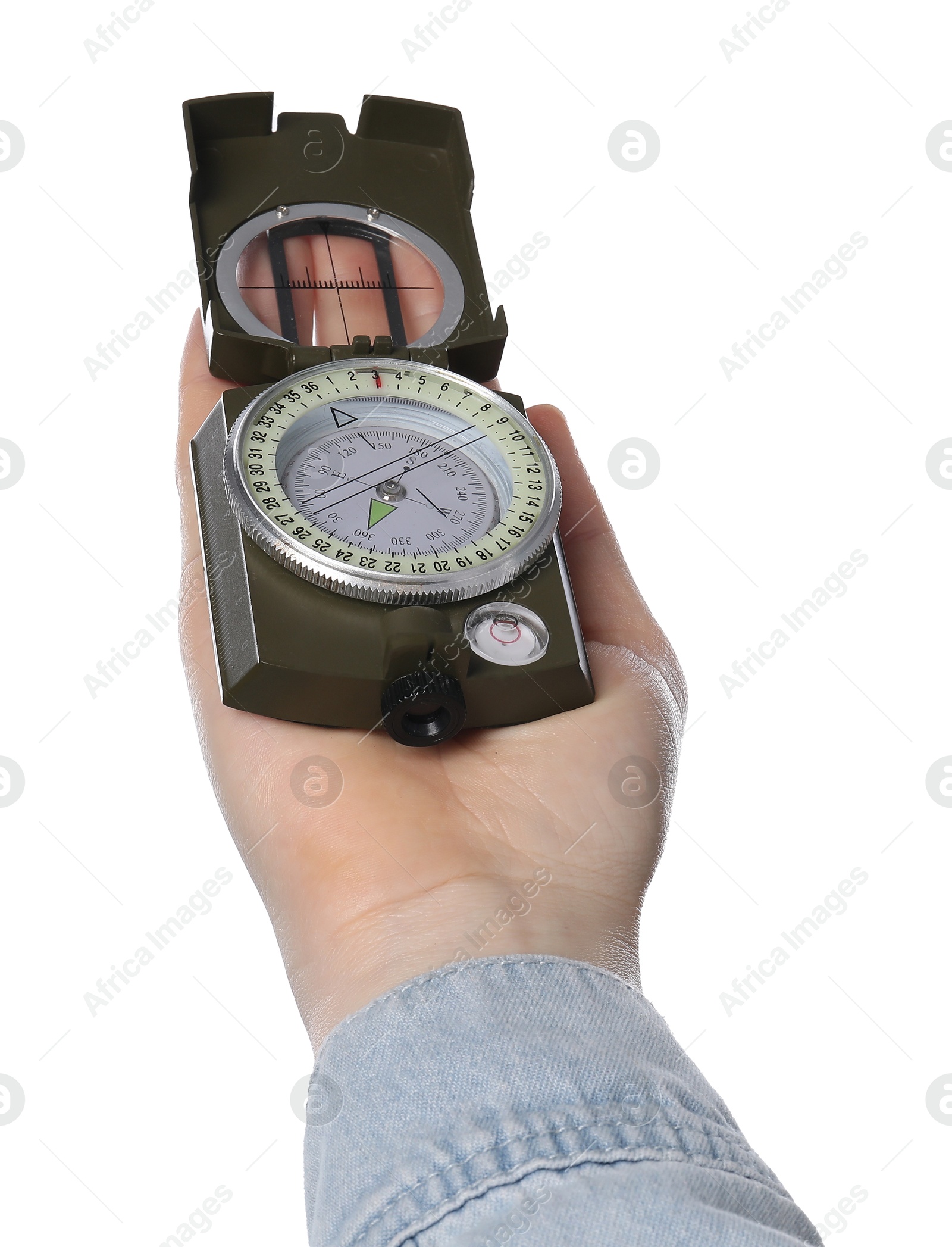 Photo of Woman holding compass on white background, closeup