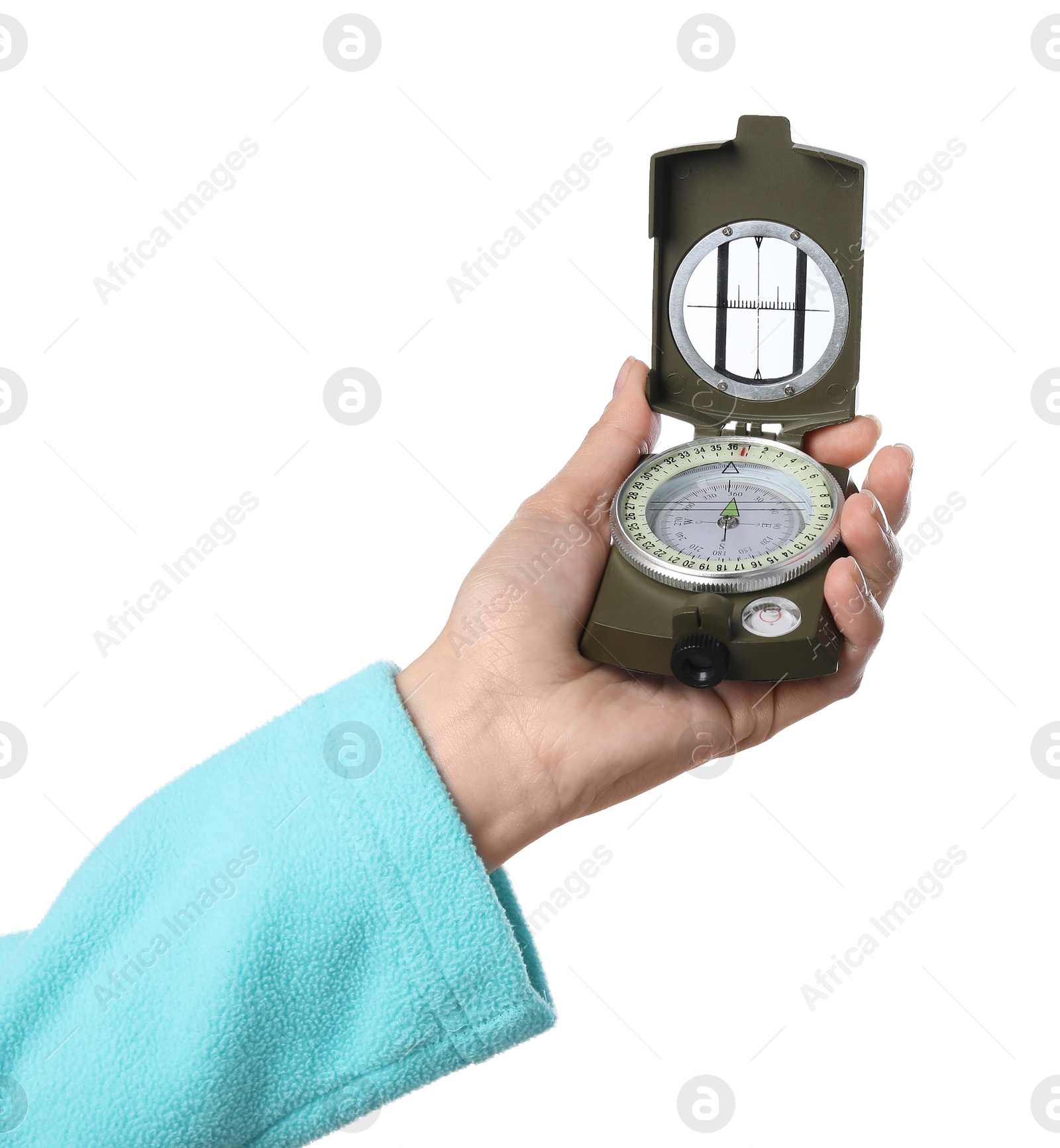 Photo of Woman holding compass on white background, closeup