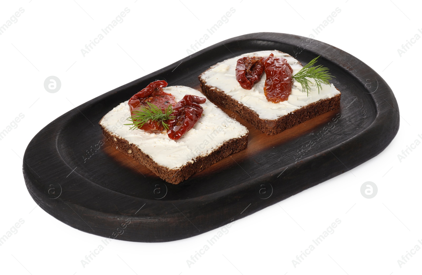 Photo of Delicious bruschettas with ricotta cheese, sun dried tomatoes and dill isolated on white