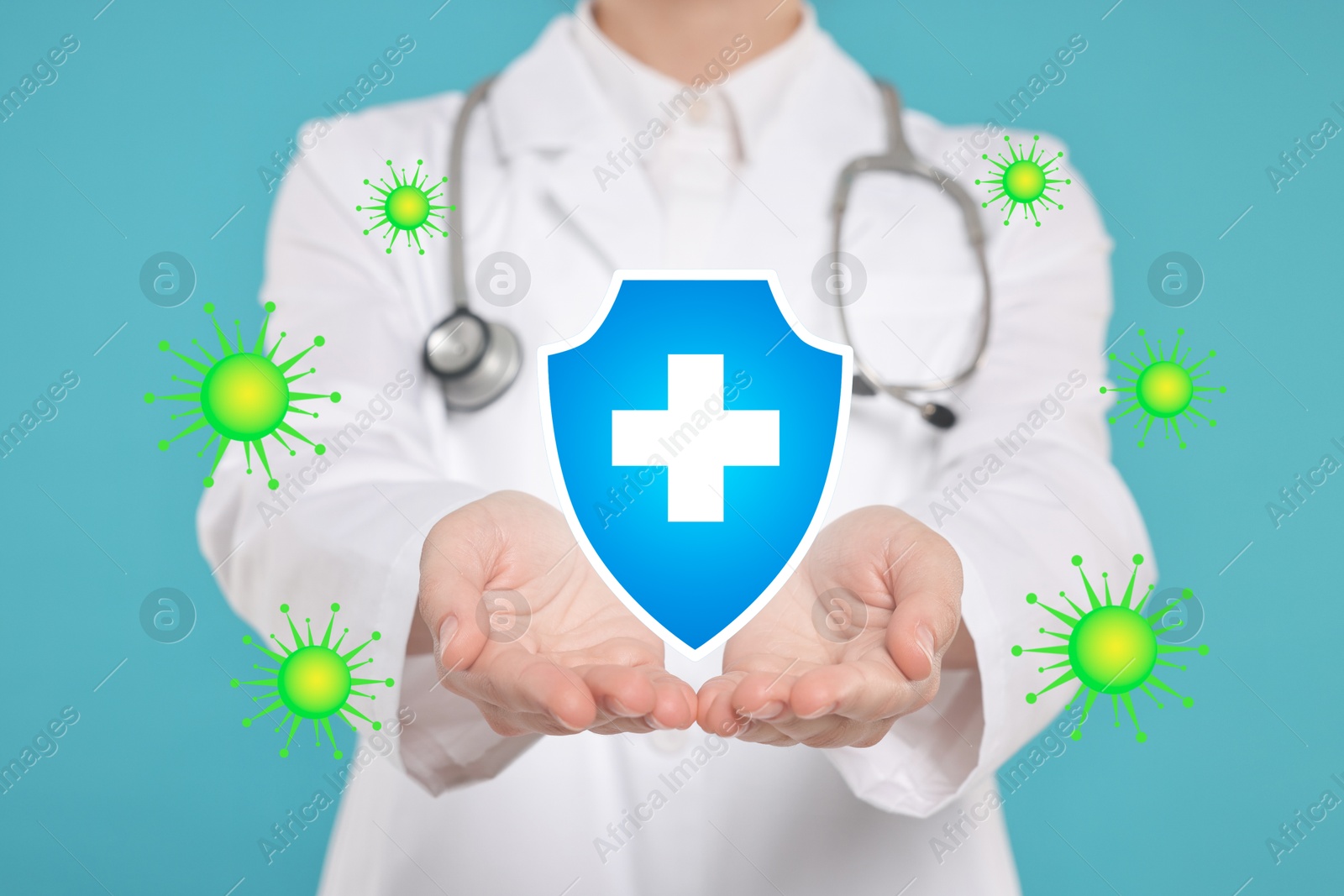 Image of Strong immunity blocking viruses. Doctor holding illustration of shield on light blue background, closeup