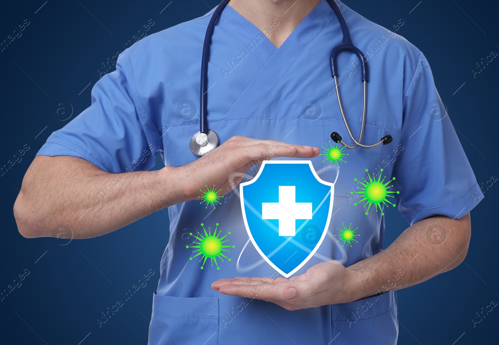 Image of Strong immunity blocking viruses. Doctor holding illustration of shield on blue background, closeup