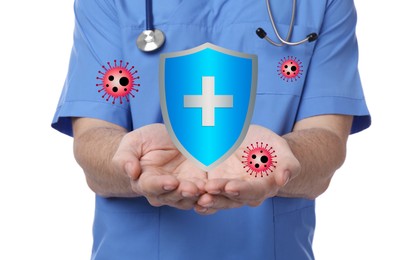 Strong immunity blocking viruses. Doctor holding illustration of shield on white background, closeup