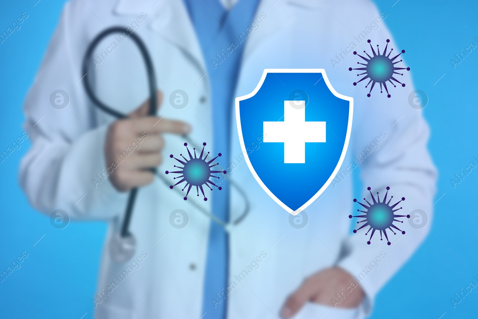 Image of Strong immunity, concept. Doctor and illustration of shield and viruses on light blue background