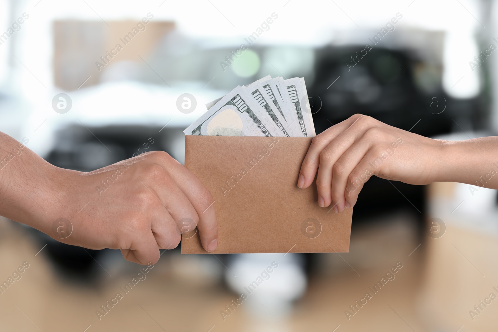 Image of Woman giving money to seller in automotive shop, closeup. Buying car