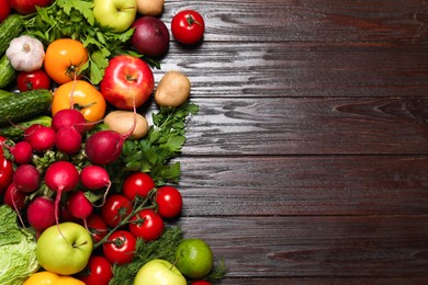 Different vegetarian products on wooden table, top view. Space for text