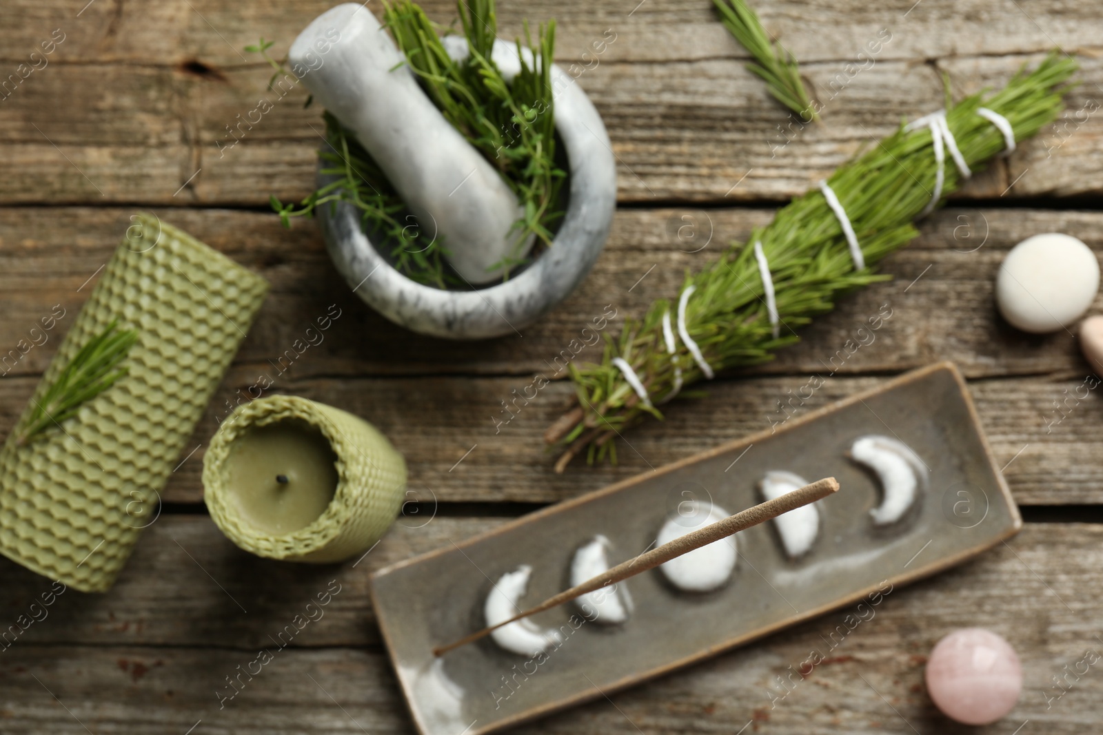 Photo of Flat lay composition with incense stick in holder on wooden table