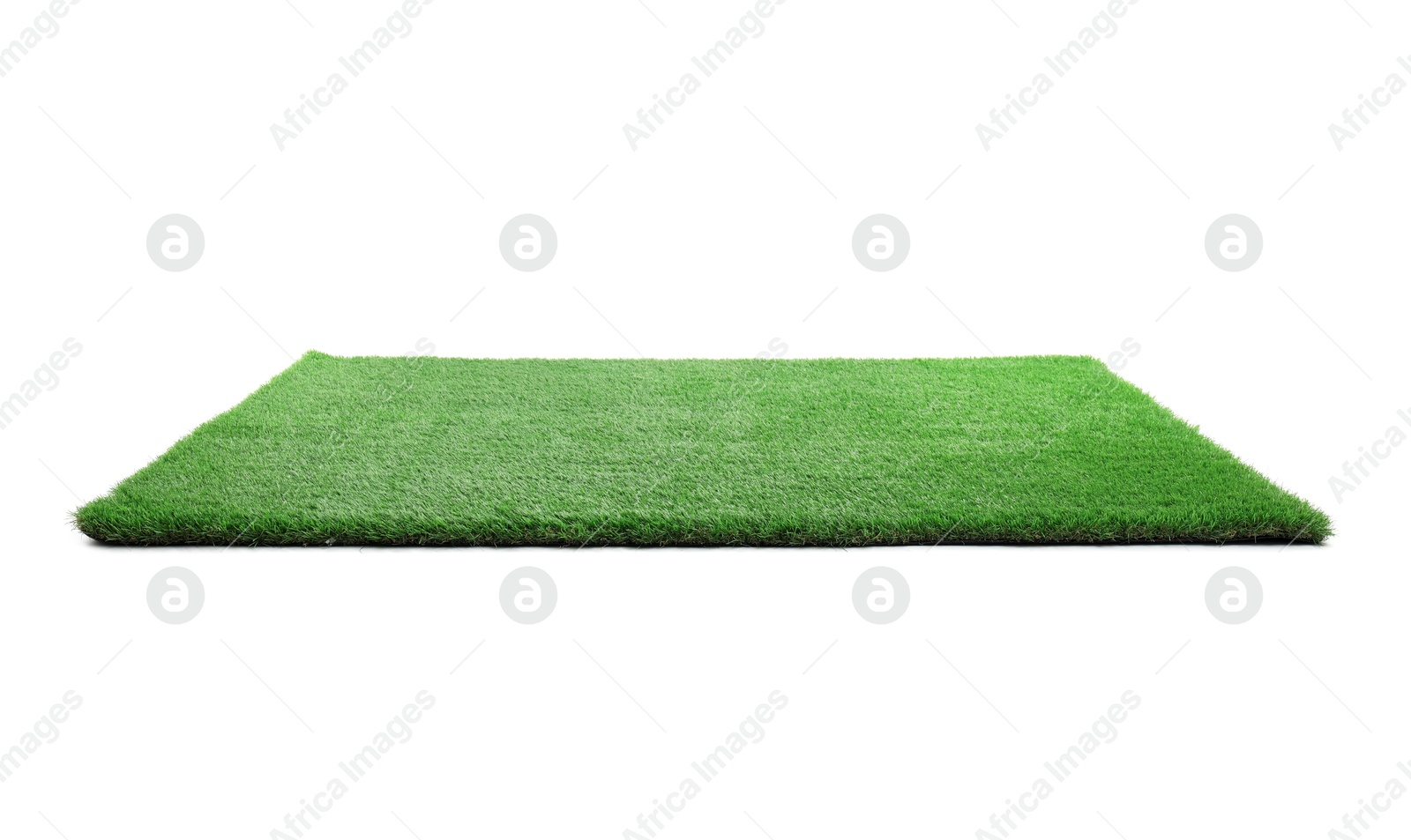 Photo of Green artificial grass isolated on white. Garden decor