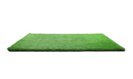 Photo of Green artificial grass isolated on white. Garden decor