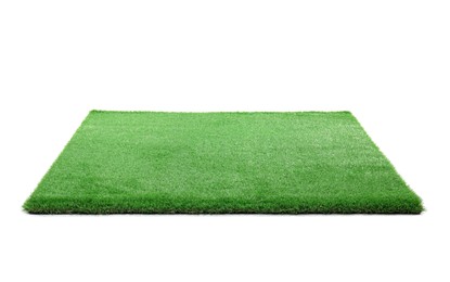 Green artificial grass isolated on white. Garden decor