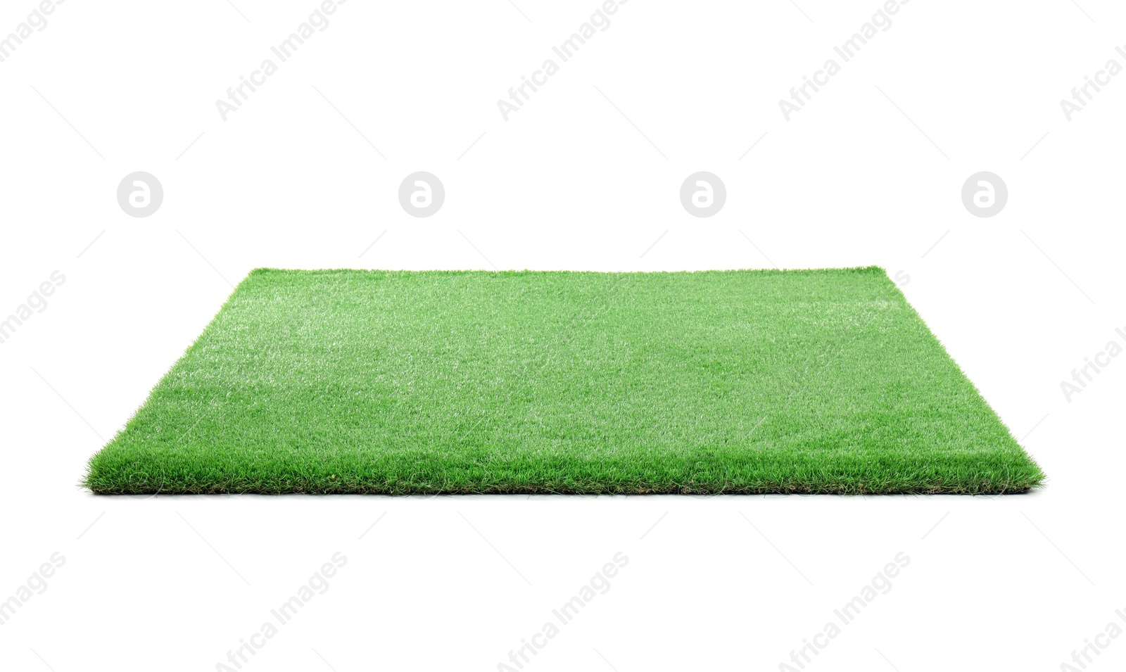 Photo of Green artificial grass isolated on white. Garden decor