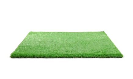 Green artificial grass isolated on white. Garden decor